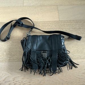 PROENZA SCHOULER Black leather crossbody bag with fringe detail